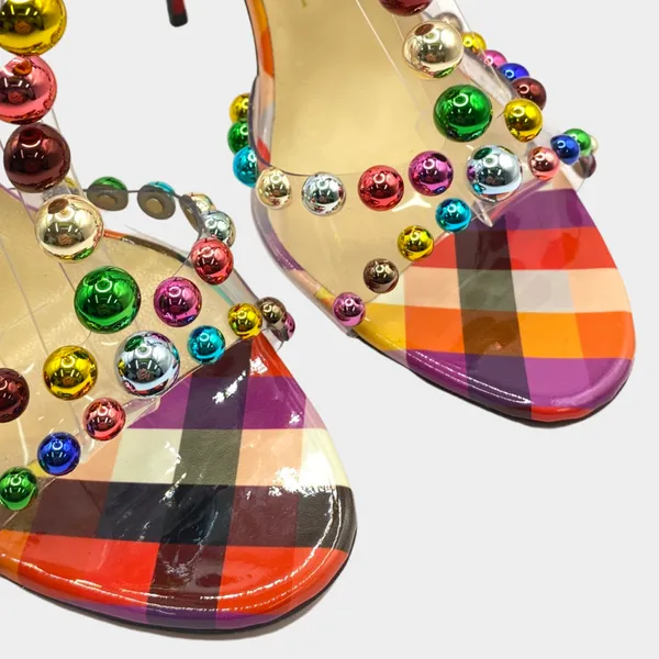 Christian Louboutin multicolour heels with metallic studs and a bow