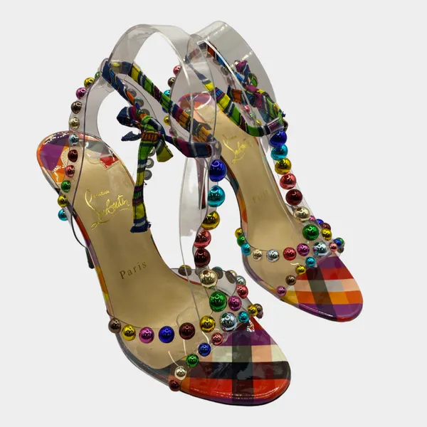 Christian Louboutin multicolour heels with metallic studs and a bow