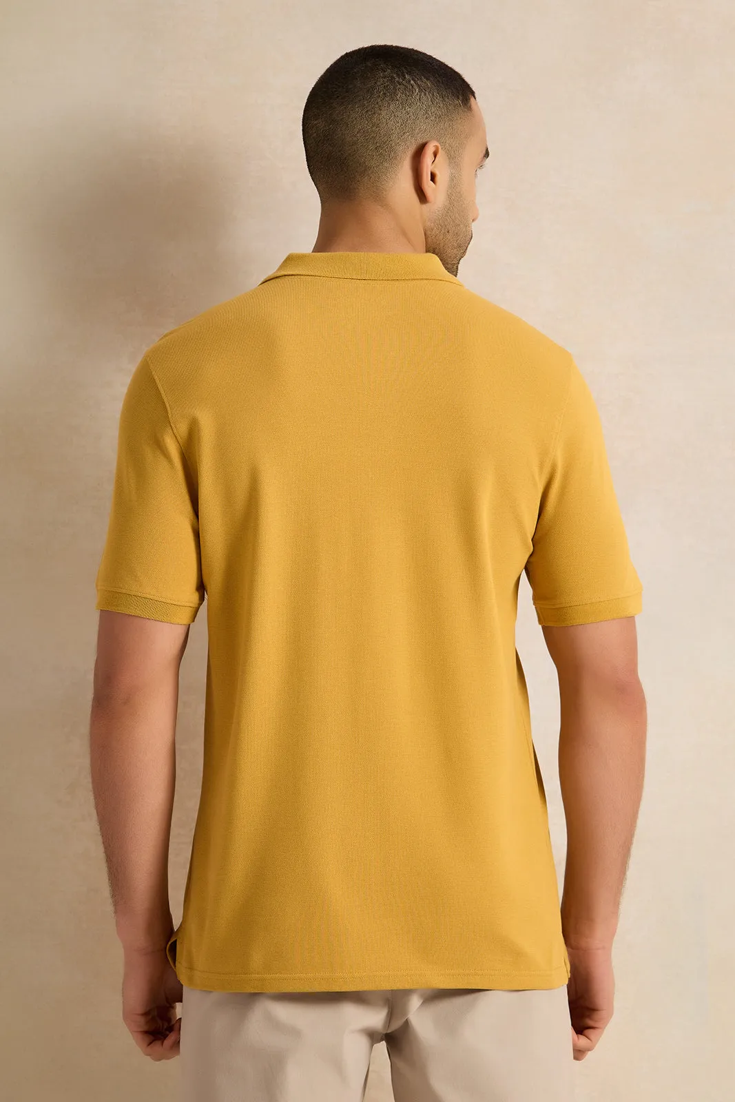 Men Mustard Solid Polo Shirt