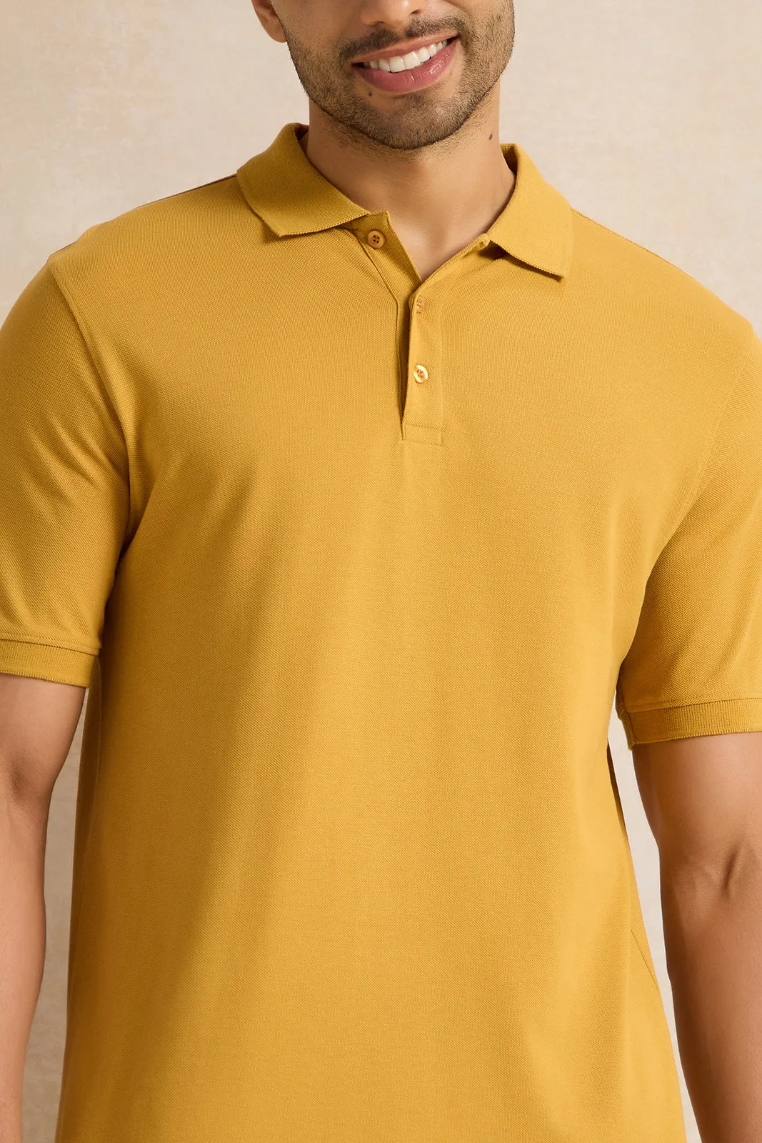 Men Mustard Solid Polo Shirt