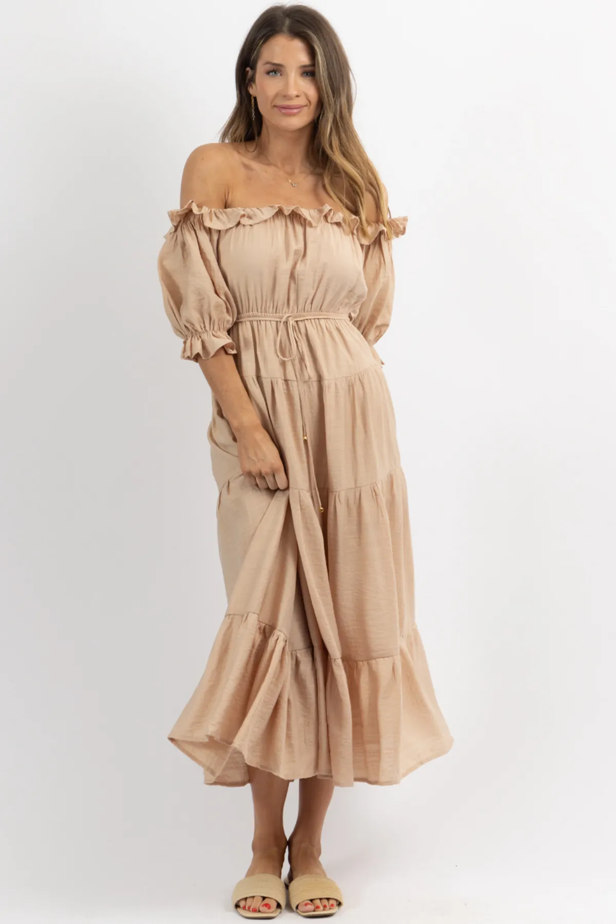 NUDE OFF SHOULDER RUFFLE + TIE WAIST MAXI DRESS