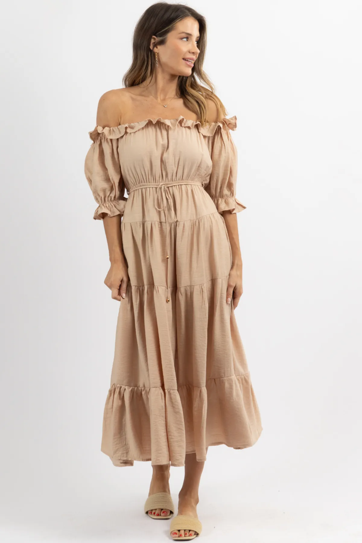 NUDE OFF SHOULDER RUFFLE + TIE WAIST MAXI DRESS