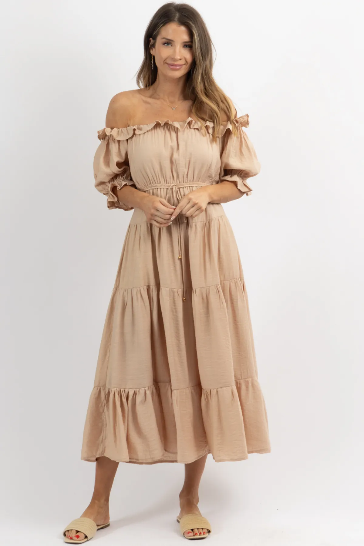 NUDE OFF SHOULDER RUFFLE + TIE WAIST MAXI DRESS