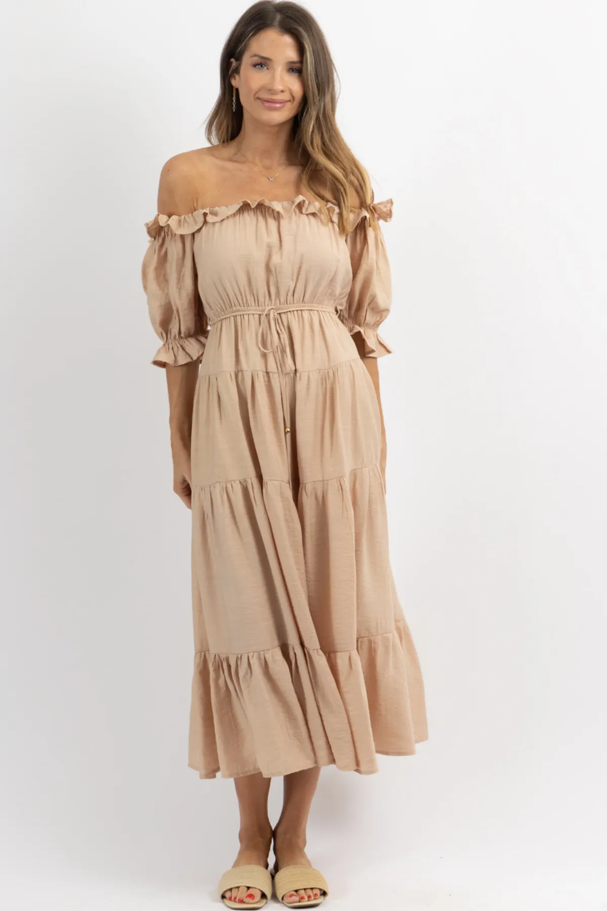 NUDE OFF SHOULDER RUFFLE + TIE WAIST MAXI DRESS